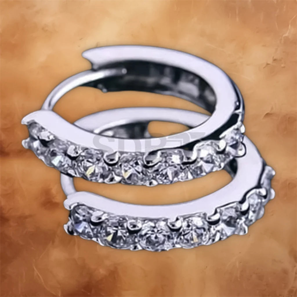 Angled view of Women's 925 sterling silver crystal hoop stud earrings featuring shimmering crystal accents.