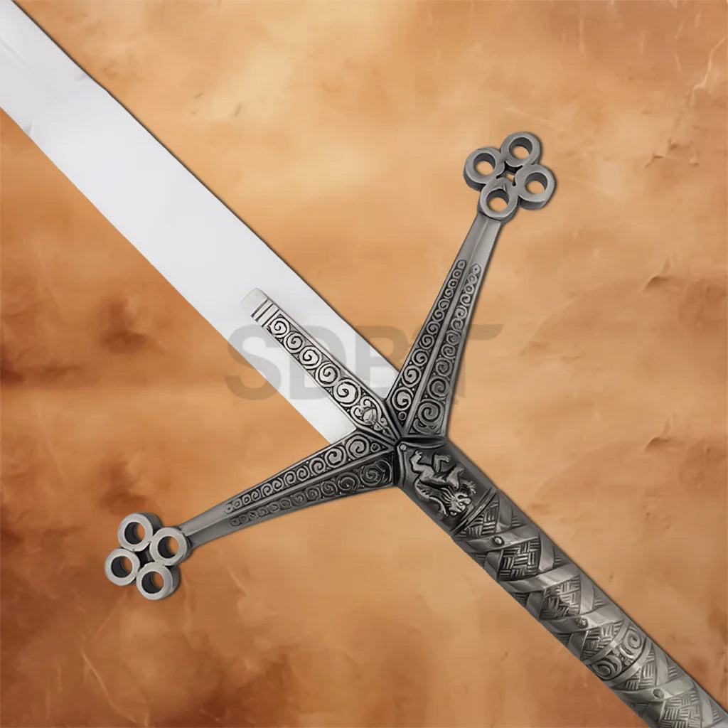 Close-up of the Medieval Black Knight Claymore Sword Replica highlighting the ornate engraved crossguard, decorative medieval patterns, and polished blade.