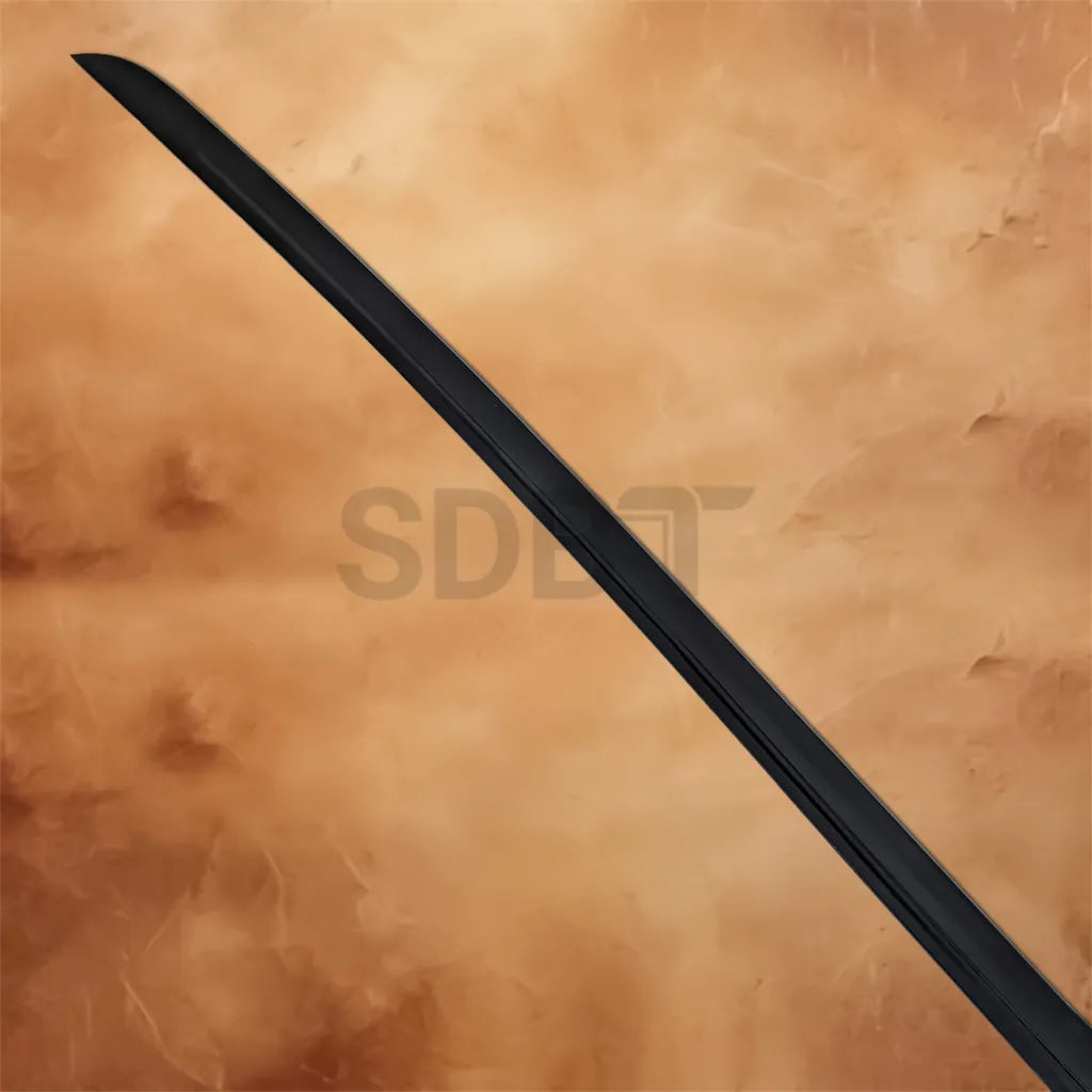 Close-up of the black blade of a Japanese Samurai Katana replica with a smooth finish.