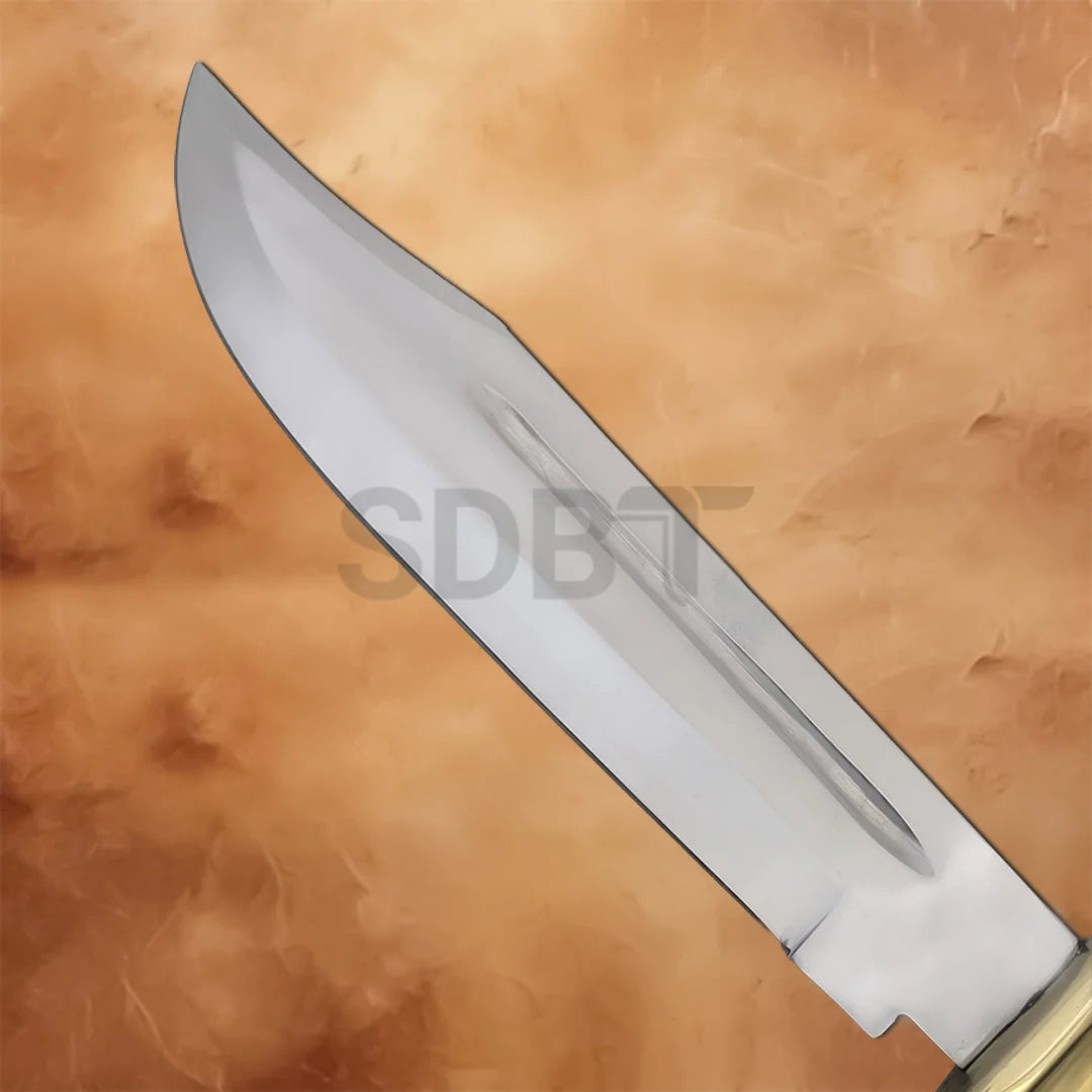 Close-up of the Crocodile Dundee Bowie Knife Replica highlighting the wide stainless steel blade with a deep fuller and mirror-polished finish.