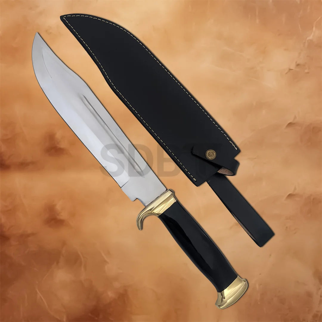 Crocodile Dundee Bowie Knife Replica displayed with its black leather sheath, polished stainless steel blade, brass fittings, and comfortable black handle.
