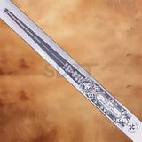 Close-up of the engraved He-Man Power Sword Replica 42 Inches featuring detailed Sword of Power artwork and polished stainless steel blade.