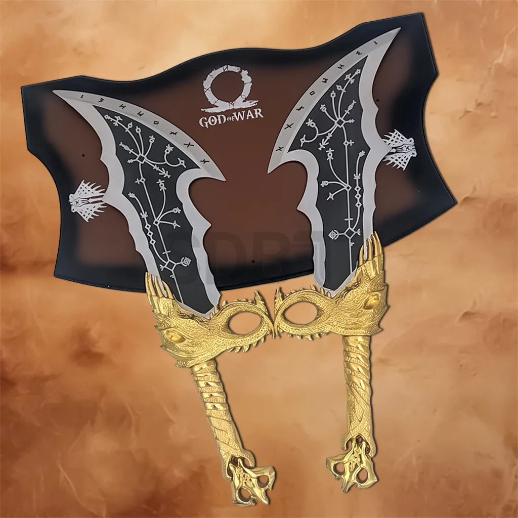 God of War Blades of Chaos Gold Finished replica mounted on a wooden display plaque with engraved twin blades and ornate gold dragon handles.