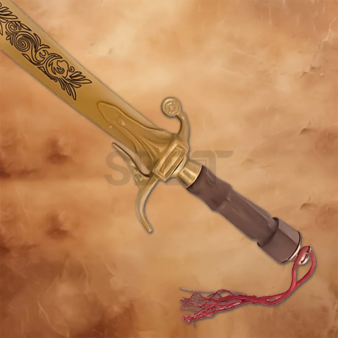 Close-up of an Arabian dragon scimitar sword showing its gold engraved blade and ornate guard.