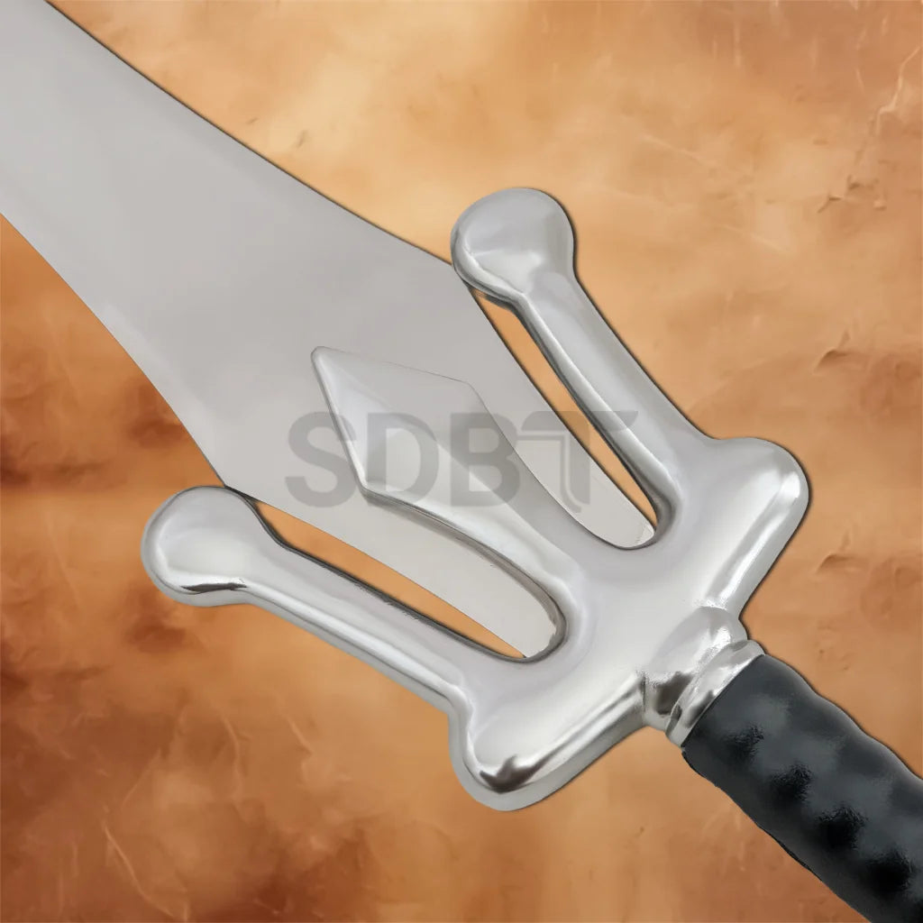 Detailed close-up of the He-Man Power Sword Replica showcasing the iconic silver crossguard with central raised emblem and polished blade.