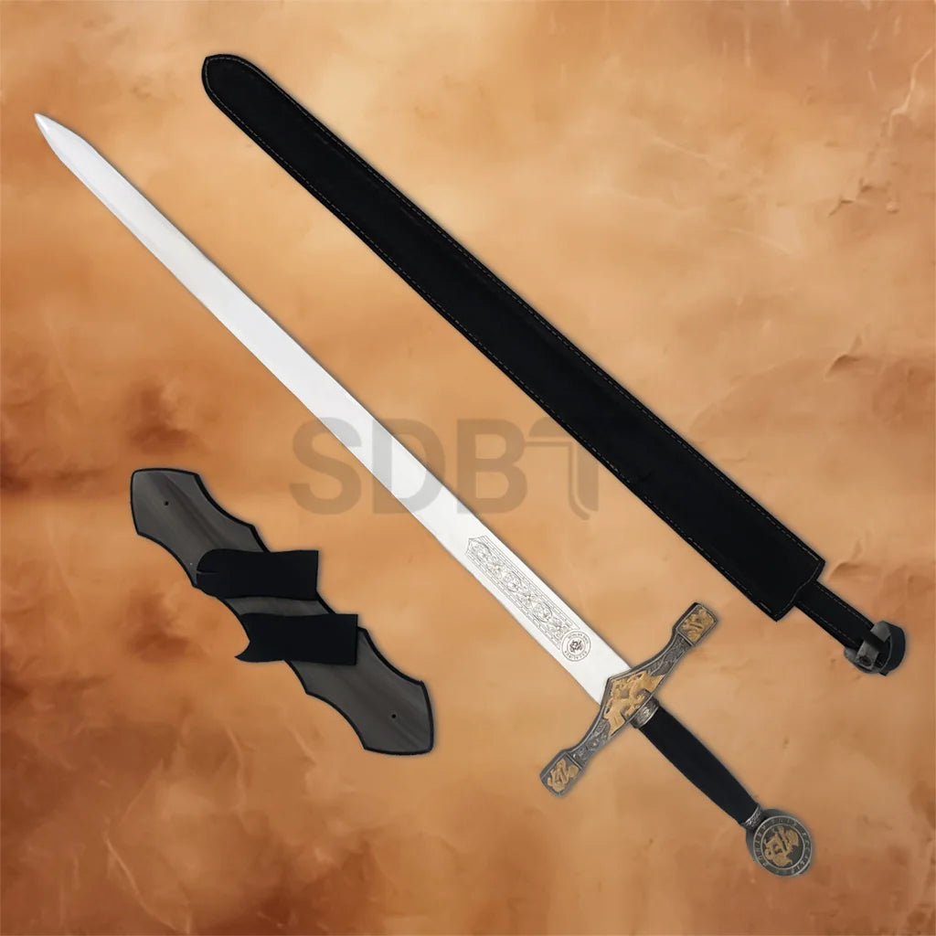 King Arthur Excalibur sword medieval replica with ornate gold and silver guard, black handle and matching sheath.