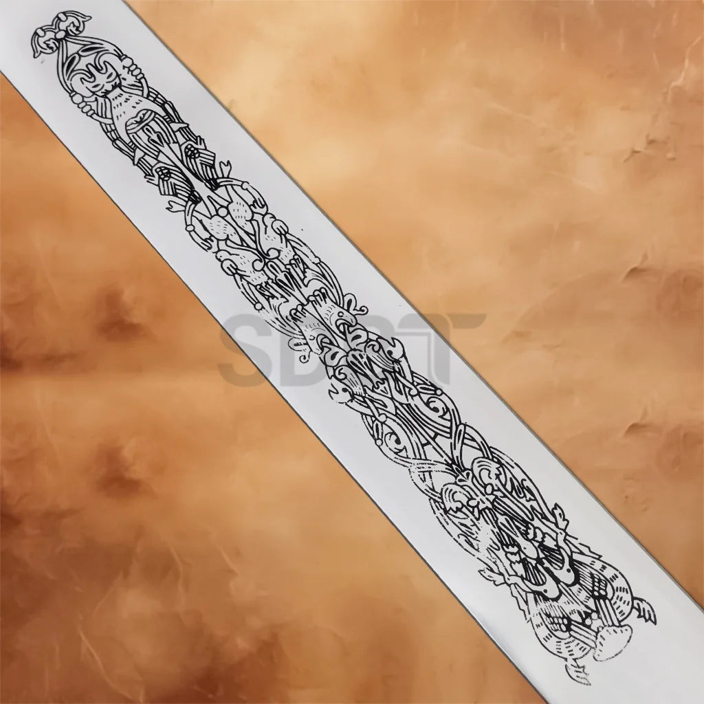 Close-up of the engraved blade artwork on King Arthur's Excalibur Sword in the Stone Collectors Replica.