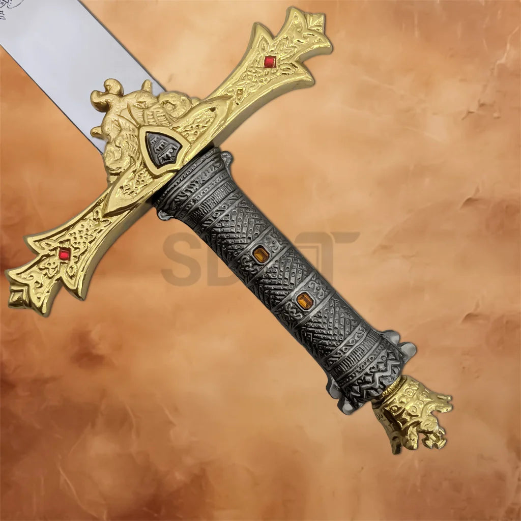 Detailed close-up of the ornate gold crossguard, decorative grip, and pommel on King Arthur's Excalibur Sword Collectors Replica.