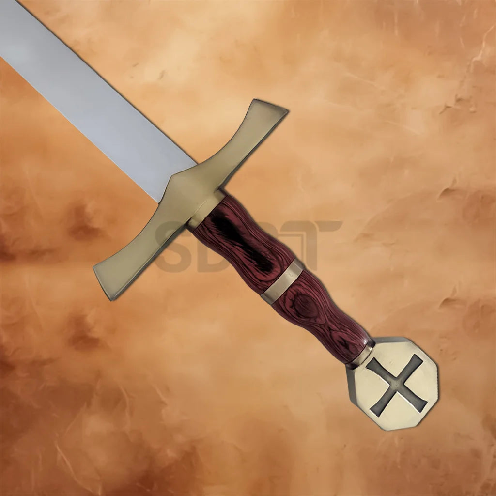 Detailed view of the Knights Crusader Cross Sword Replica featuring the brass crossguard, wood-grain handle, and engraved cross pommel.
