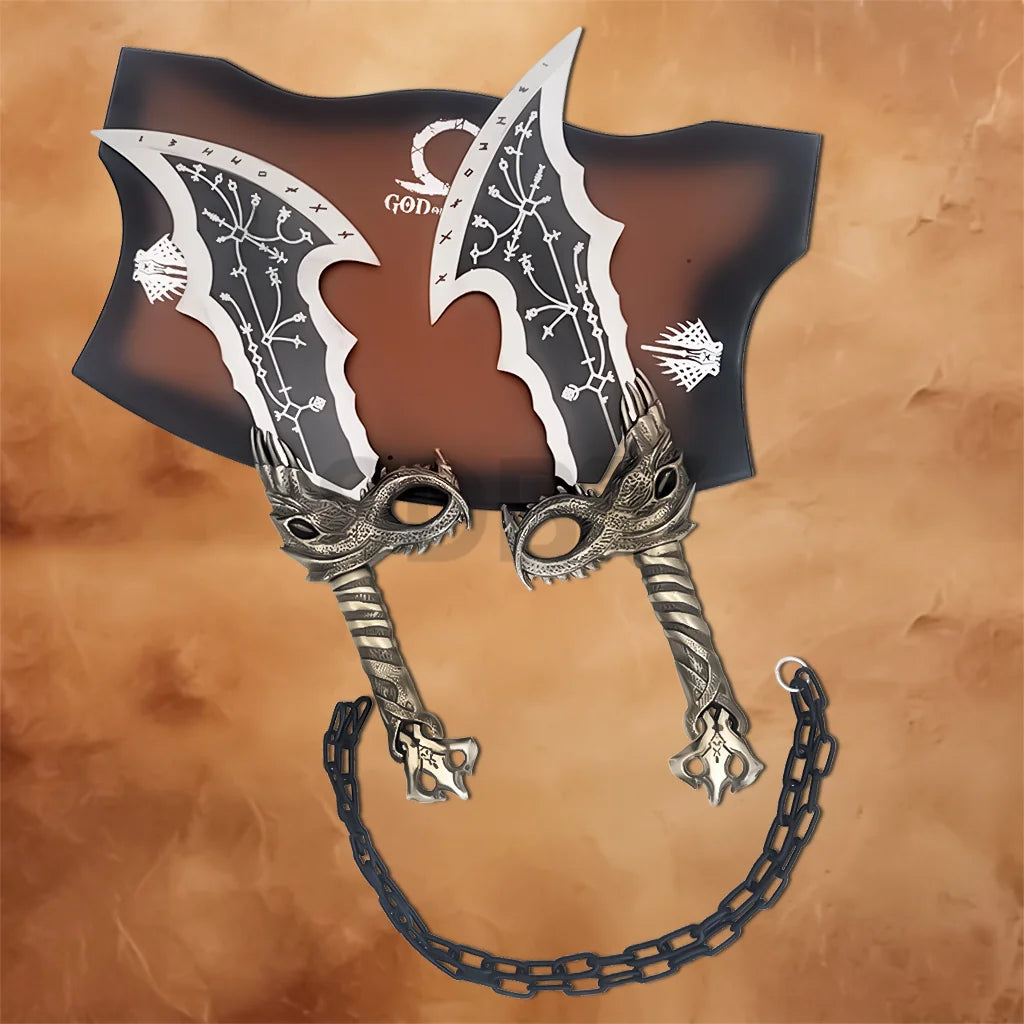 Angled view of the Kratos Blades of Chaos replica mounted on a God of War display plaque with connecting chain.