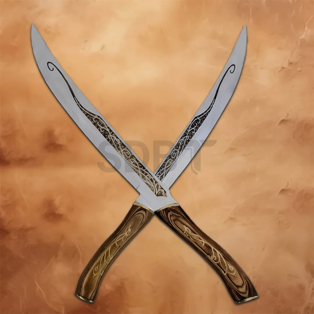 Pair of Legolas Elf Fighting Daggers Replica featuring engraved stainless steel blades, detailed wooden-style handles, and an authentic fantasy design inspired by Lord of the Rings.