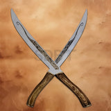 Pair of Legolas Elf Fighting Daggers Replica featuring engraved stainless steel blades, detailed wooden-style handles, and an authentic fantasy design inspired by Lord of the Rings.