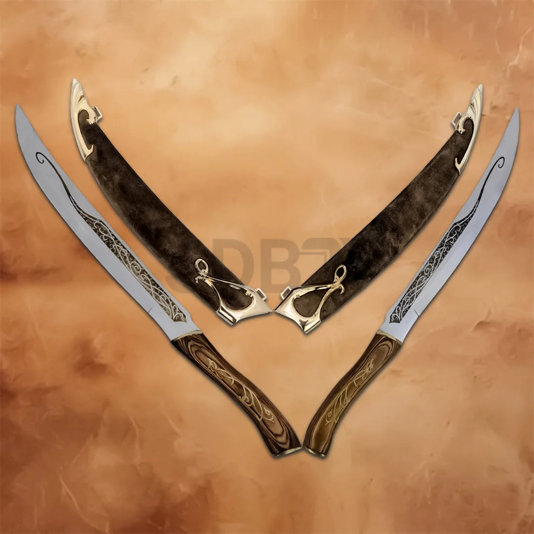 Legolas Elf Fighting Daggers Replica set displayed with matching decorative scabbards, engraved blades, and elegant elven-style handles for collectors and fantasy displays.