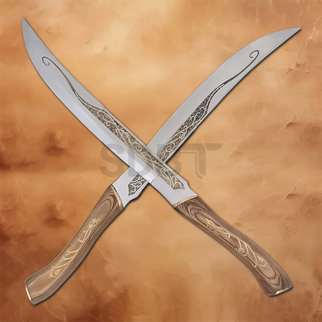 Legolas Fighting Daggers Replica Set inspired by The Lord of the Rings featuring twin engraved Elven blades with detailed wooden handles for collectors and display.
