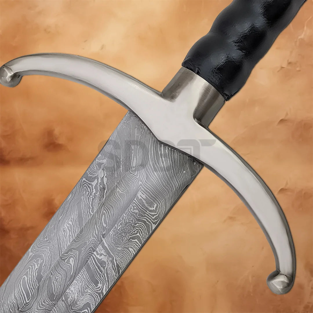 Detailed close-up of the Longclaw Jon Snow 49-inch Damascus Steel Sword Replica showing the polished crossguard and Damascus steel blade
