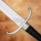 Close-up of the Longclaw Jon Snow 49-inch Stainless Steel Sword Replica featuring the black leather grip and iconic direwolf head pommel