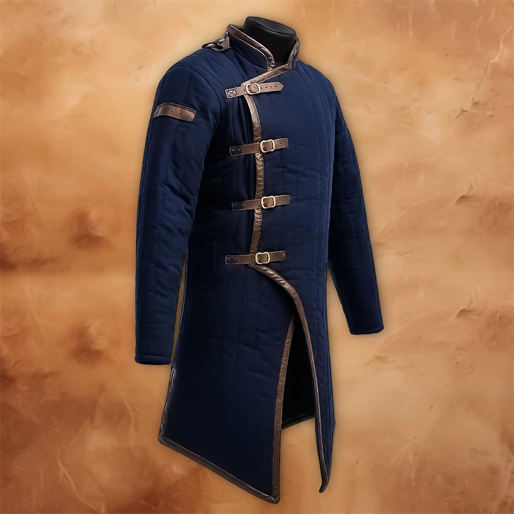 Front view of a Medieval Blue Gambeson Padded Armor Jacket featuring quilted padding, long sleeves, a high collar, decorative brown leather trim and multiple buckle fastenings.