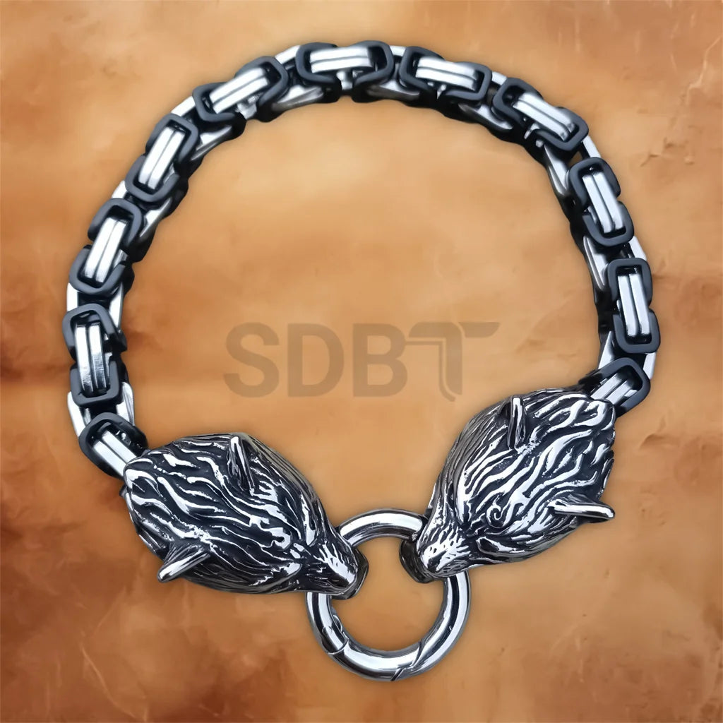 Angled view of the Men's Wolf Chain Bracelet featuring detailed Viking Norse wolf heads and polished stainless steel.