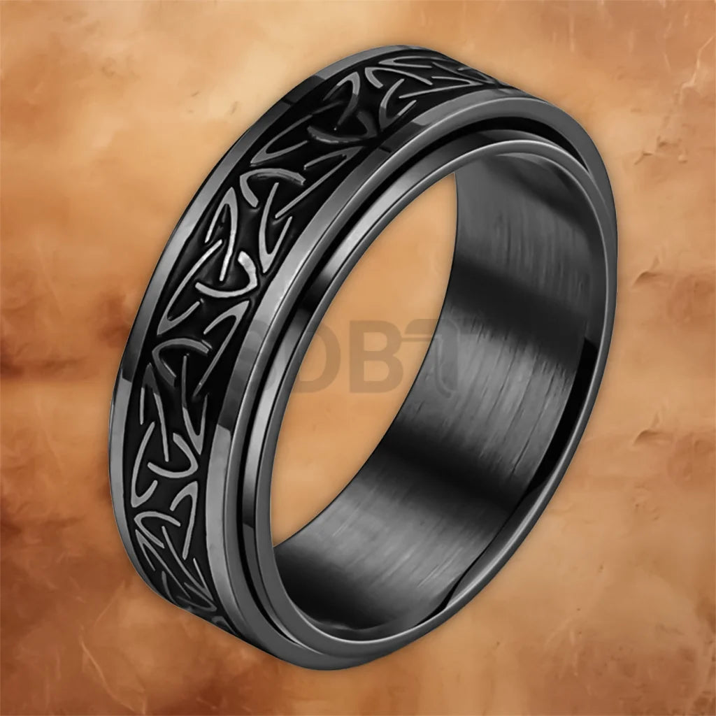 Detailed view of the rotating band and Nordic engraving on the Viking steel spinner ring.