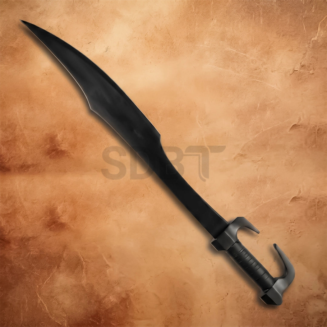 Detailed view of the Leonidas replica blade highlighting its distinctive leaf-shaped profile and tactical matte black coating.