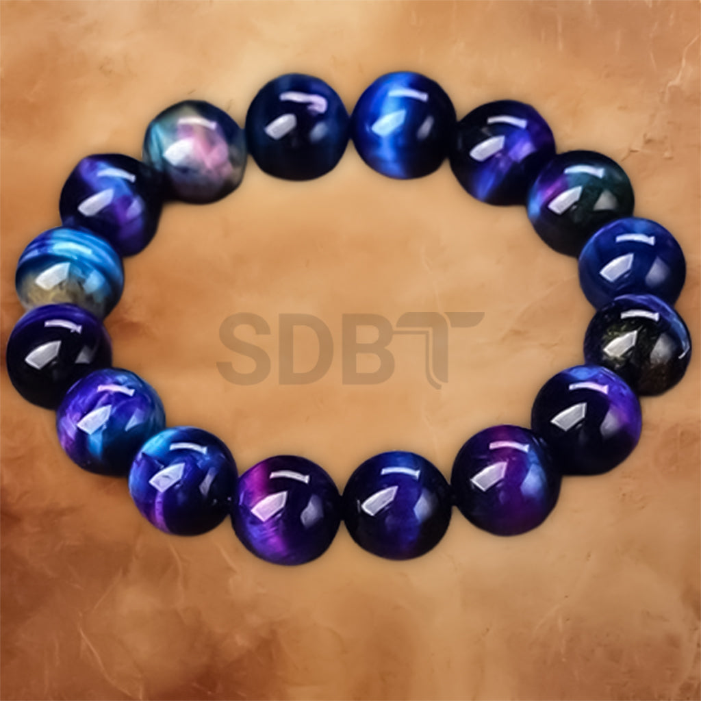 Unisex Galaxy Tiger Eye gemstone bracelet featuring purple and blue natural stone beads with a polished finish.