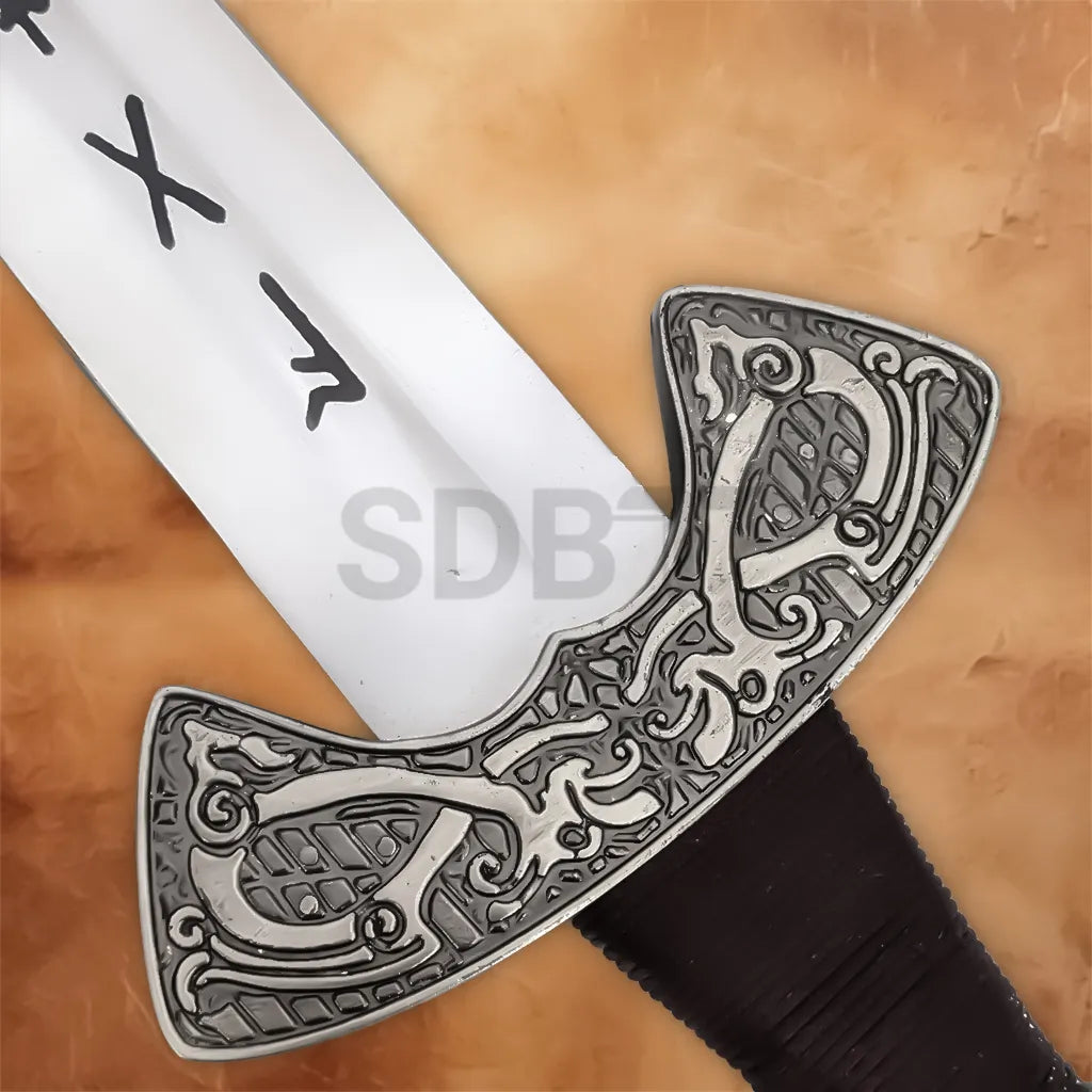 Detailed engraved silver hilt of Viking Norse sword replica