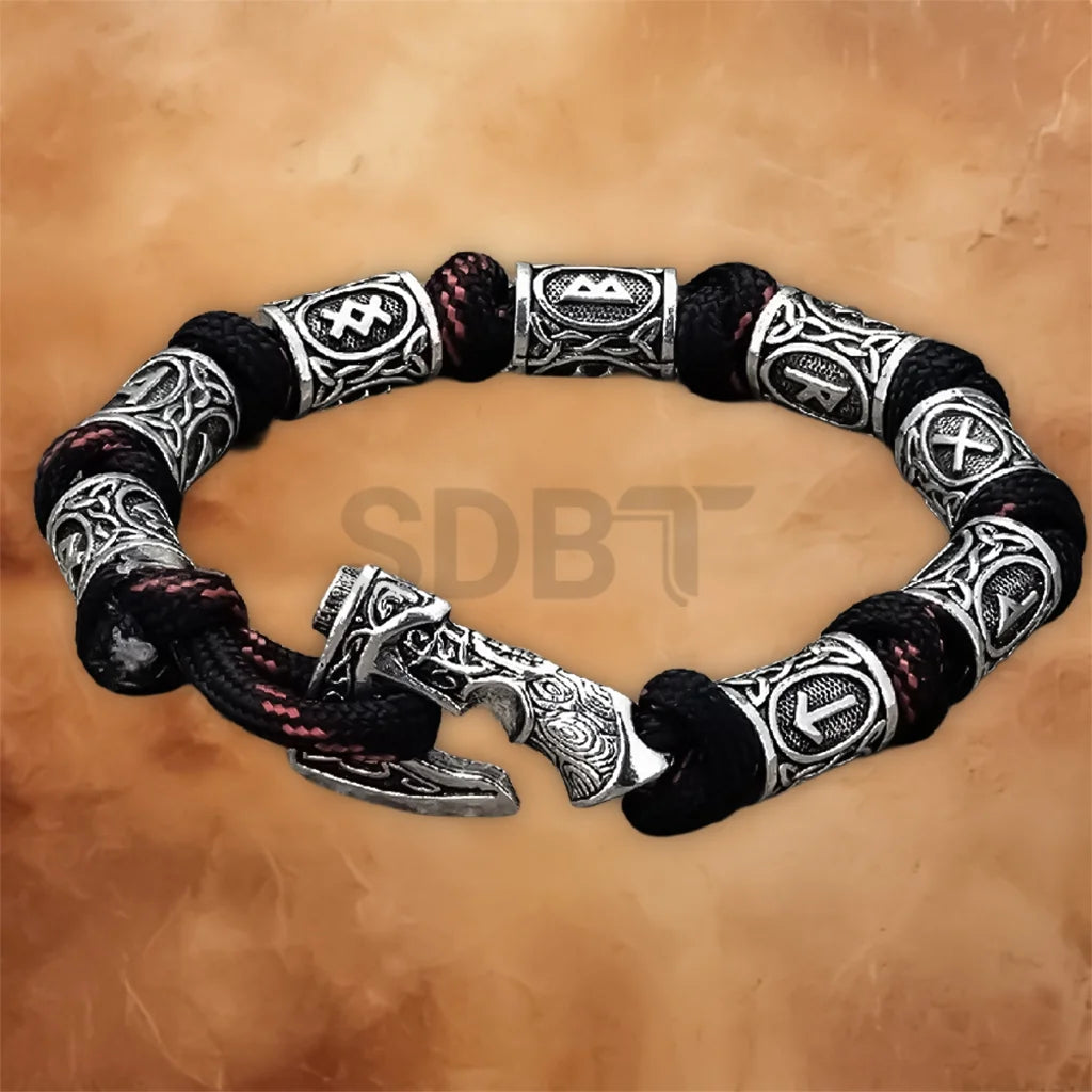 Angled view of the Viking Rune Axe Paracord Bracelet with Celtic-inspired detailing and adjustable braided paracord design.