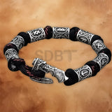 Angled view of the Viking Rune Axe Paracord Bracelet with Celtic-inspired detailing and adjustable braided paracord design.