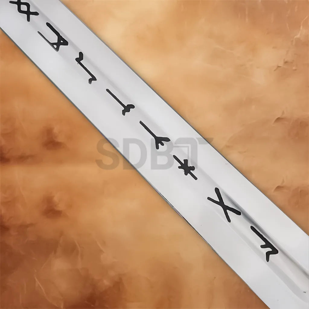 Close-up of Viking sword blade featuring black Norse rune markings