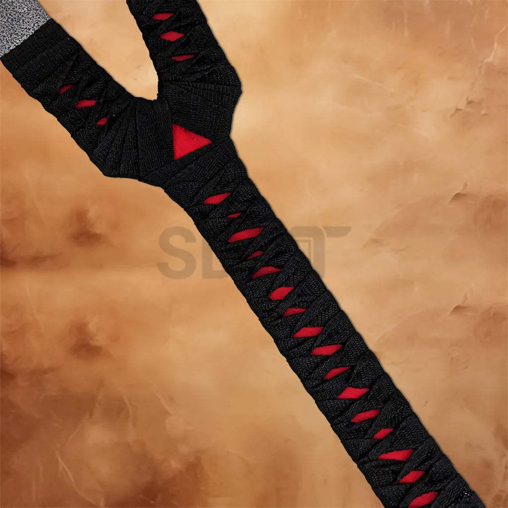 Close-up of the black and red wrapped handle on the Volkoth Fantasy Axe Replica, providing a secure grip and striking fantasy design.