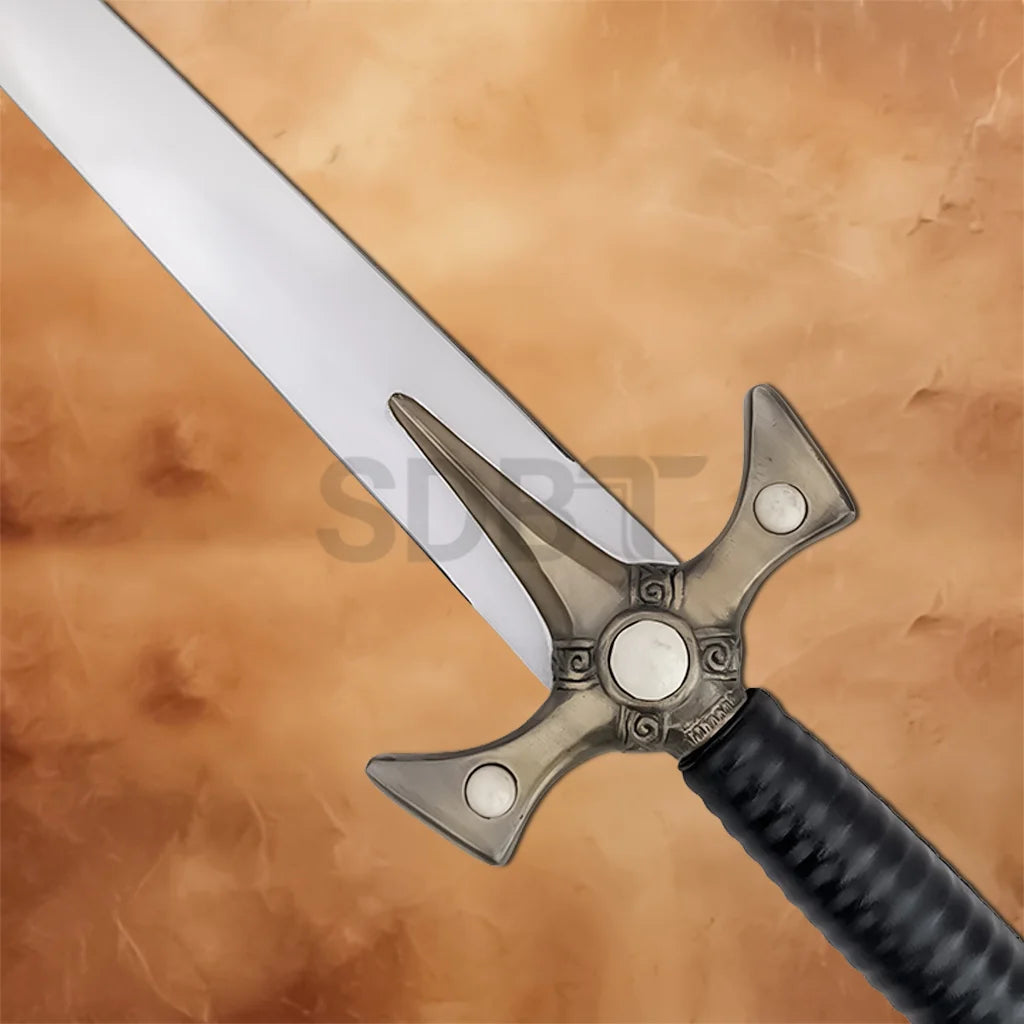 Detailed close-up of the Xena Warrior Princess Sword Replica crossguard with antique-finish metal and decorative circular accents
