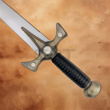 Close-up of the Xena Warrior Princess Sword Replica hilt featuring a black wrapped grip, decorative crossguard, and rounded pommel